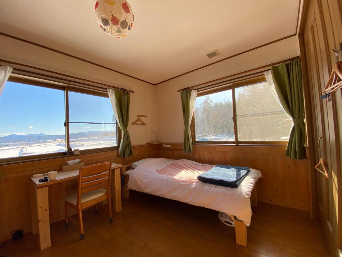 Azumino Backpackers 山の風 Hotel Matsukawa Bagian luar foto
