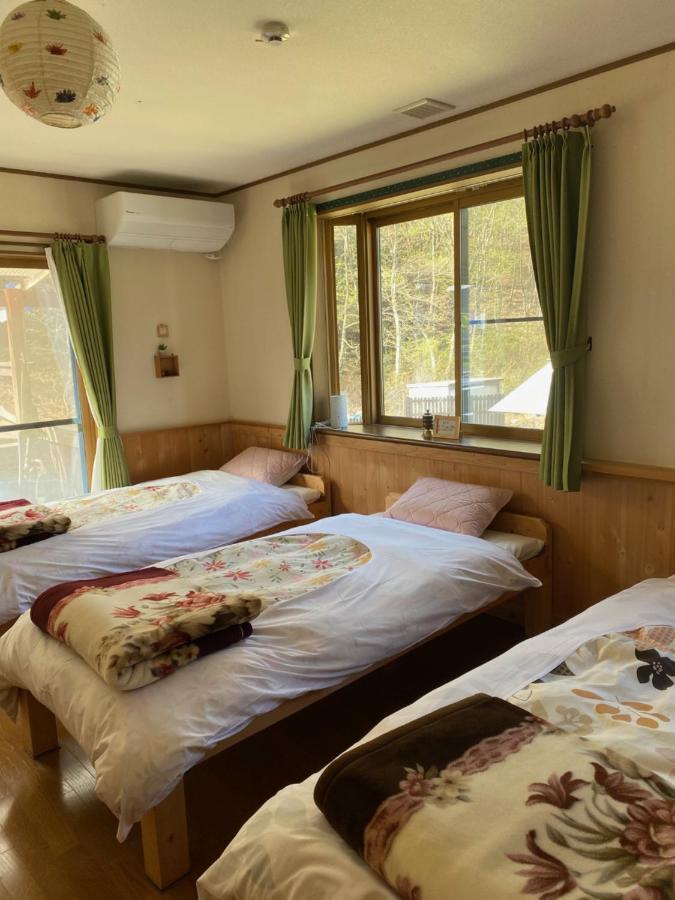 Azumino Backpackers 山の風 Hotel Matsukawa Bagian luar foto
