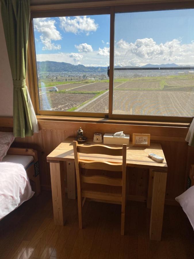 Azumino Backpackers 山の風 Hotel Matsukawa Bagian luar foto